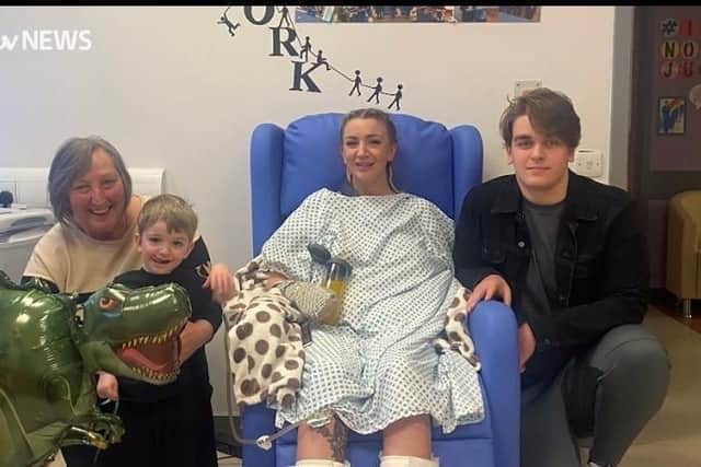 Sadie has had the support of her family and friends throughout her experience. She is pictured here with her mum, Dawn Kemp, and two sons, Hendrix, 2, and Kinzie, 16.
