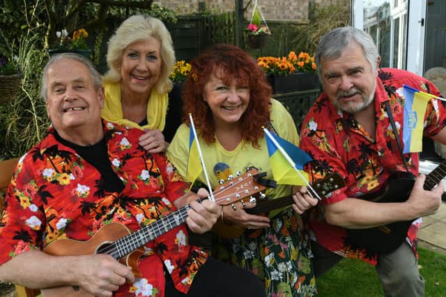 John and Rosie Sandall with Ukulele band members Mandy Chasney and Jim Stowe who will take part in a Ukraine fundraiser. EMN-220329-161255009