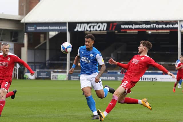 Jonson Clarke-Harris in action for Posh against Swindon.