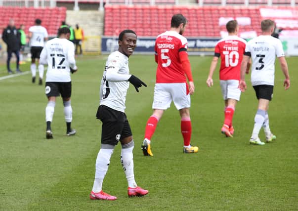 Siriki Dembele of Peterborough United celebrates scoring the opening goal against Swindon Town. Photo: Joe Dent/theposh.co.m
