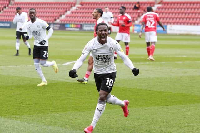 Siriki Dembele of Peterborough United celebrates scoring the opening goal against Swindon Town - Mandatory by-line: Joe Dent/JMP - 10/04/2021 - FOOTBALL - County Ground - Swindon, England - Swindon Town v Peterborough United - Sky Bet League One EMN-211004-160010005