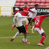 Jonson Clarke-Harris of Peterborough United scores his sides third goal of the game against Swindon Town. Photo: Joe Dent/theposh.com.