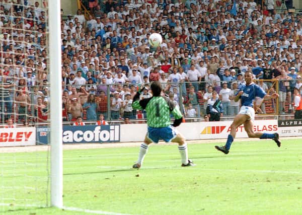 Ken Charlery scores the winning goal for Posh in the 1992 Third Division play-off final against Stockport.