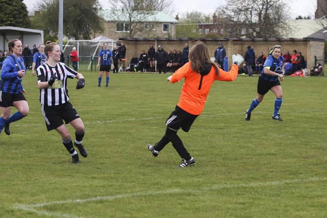 Evie Driscoll-King scores for Peterborough Northern Star Ladies Reserves against Whittlesey Athletic. Photo: Tim Symonds.
