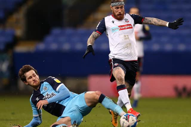 Marcus Maddison in action for Bolton against Cambridge United.