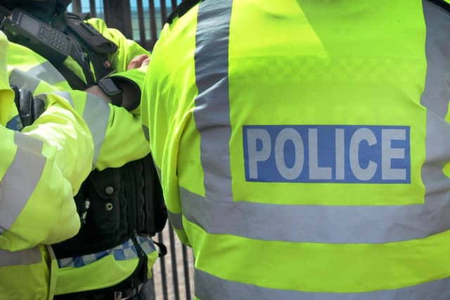 Two Cambridgeshire Police officeres are undergoing a misconduct hearing after the alleged use of a racial slur towards a colleague.