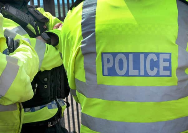 Two Cambridgeshire Police officeres are undergoing a misconduct hearing after the alleged use of a racial slur towards a colleague.