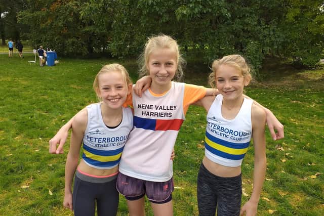 Faith Perkins (left) and Evie Hemmings recorded personal best times in Nuneaton.