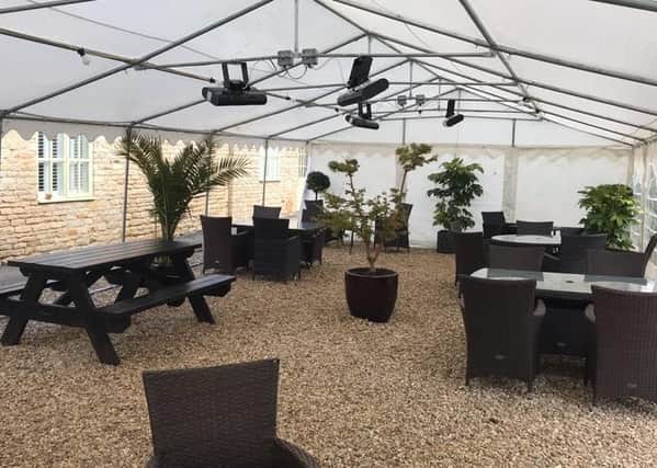 The Crown Inn  at Elton has reopened with a marquee at the back and seating at the front
