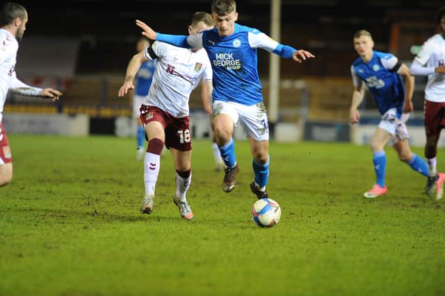 Harrison Burrows in action for Posh against Cobblers. Photo: David Lowndes.