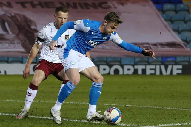 Sammie Szmodics of Peterborough United in action against Northampton Town. Photo: Joe Dent/theposh.com.