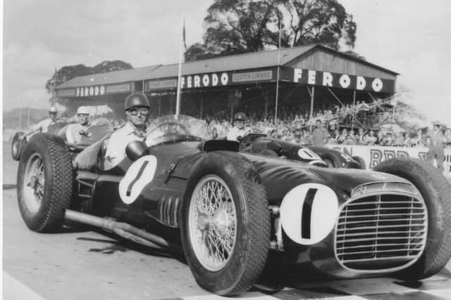 Juan-Manuel Fangio at the wheel of the V-16 BRM F1 car at Goodwood in 1953 PP4801 PPP-150816-124942001