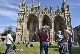 People gathered to observe a minute's silence in the Cathedral Precincts in memory of the Duke of Edinburgh. Picture: David Lowndes