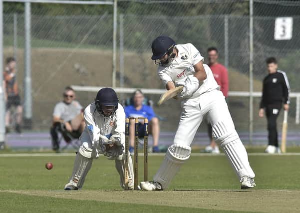 Ace Peterborough Town batsman Josh Smith in action.