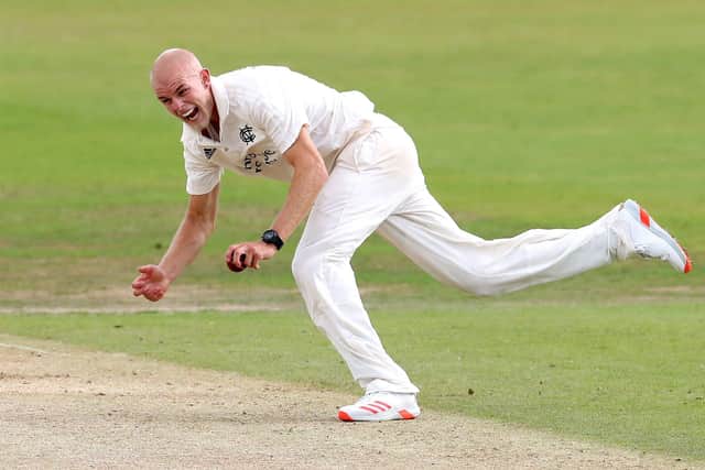Zak Chappell takes a catch while playing for Notts. Photo: Martin Rickett PA.