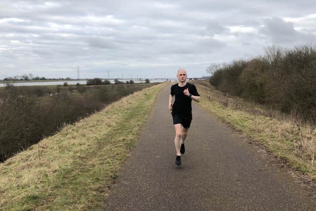 Lee Whitton running to help tackle climate change.