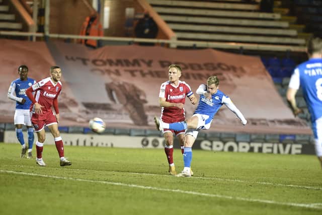 Posh star Sammie Szmodics lets fly against Gillingham. Photo: David Lowndes.