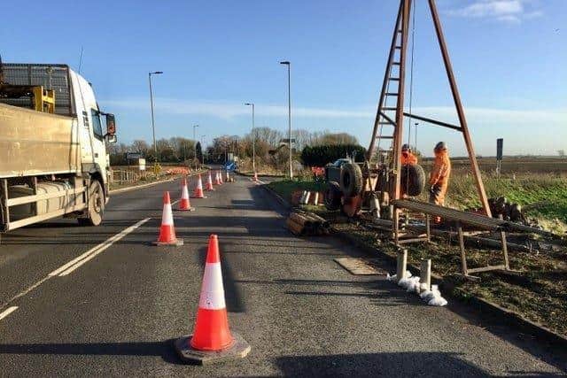 Workers at the A605