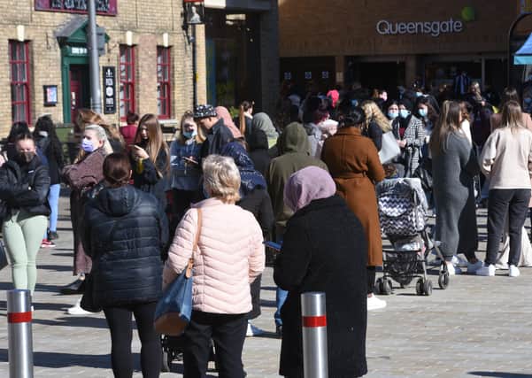 City Centre  Covid 19 lockdown restrictions ease on April 12. Queues for Primark EMN-211204-124011009