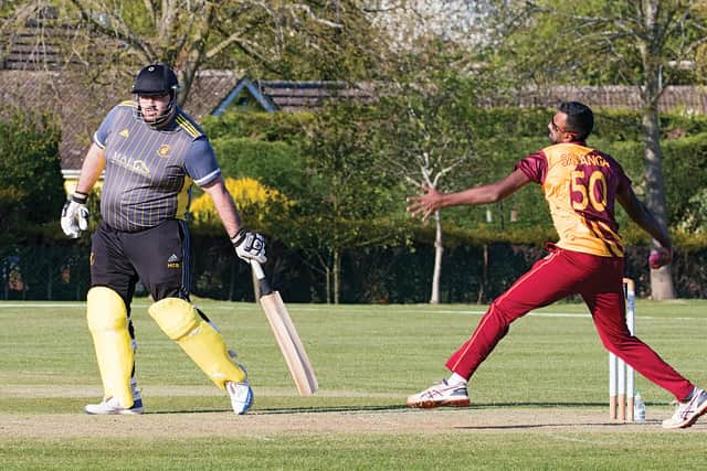 Saranga Rajaguru on his way to three wickets for March Town against Ramsey in Cambs Division One. Photo: Pat Ringham.