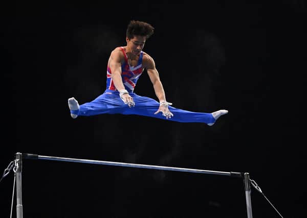 Jake Jarman competes in the high bar competition during the Men's all-around final of the 2021 European Artistic Gymnastics Championships at the St Jakobshalle, in Basel. (Photo by FABRICE COFFRINI/AFP via Getty Images).