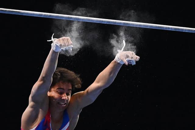 Jake Jarman in the high bar competition during the Men's all-around final of the 2021 European Artistic Gymnastics Championships at the St Jakobshalle, in Basel (Photo by FABRICE COFFRINI/AFP via Getty Images).