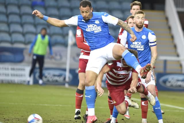 Jonson Clarke-Harris in action for Posh against Doncaster. Photo: David Lowndes.
