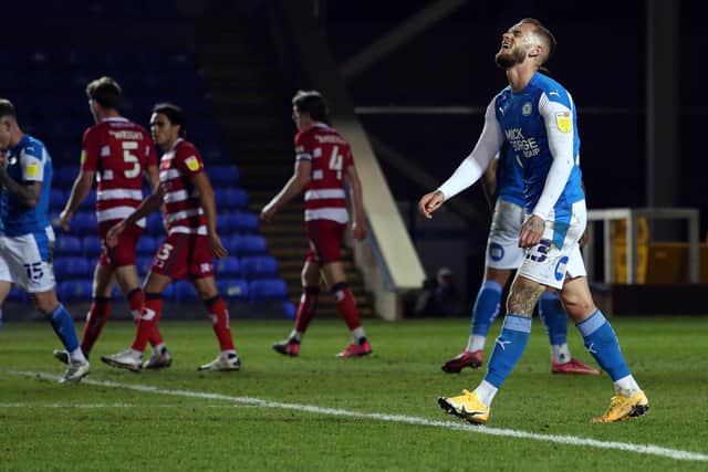 Joe Ward of Peterborough United cuts a frustrated figure during the draw with Doncaster Rovers. Photo: Joe Dent/theposh.com.