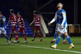 Joe Ward of Peterborough United cuts a frustrated figure during the draw with Doncaster Rovers. Photo: Joe Dent/theposh.com.