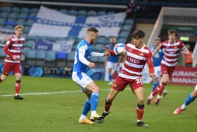 Joe Ward in action for Posh against Doncaster. Photo: David Lowndes.