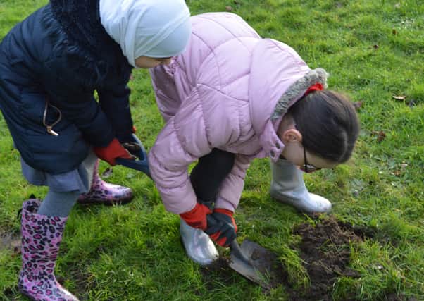 Pupils at Northborough Primary School in the school grounds