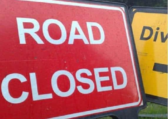 Road closed sign