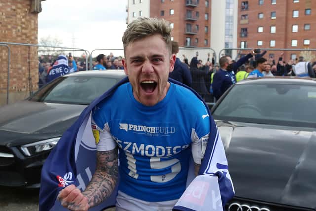Sammie Szmodics celebrates winning promotion at full-time. Photo: Joe Dent/theposh.com.