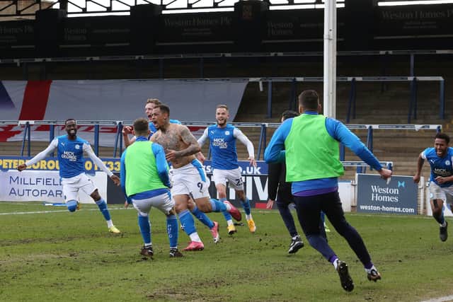 Jonson Clarke-Harris of Peterborough United celebrates the goal that sealed Peterborough United's promotion to the Championship. Photo: Joe Dent/theposh.com.
