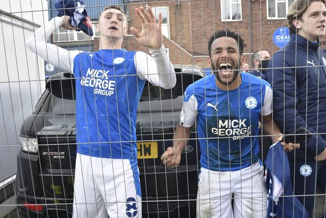 Nathan Thompson looks thrilled after Posh won promotion to the Championship. Photo: David Lowndes.