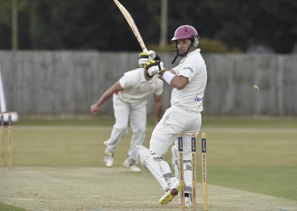 Peterborough Town skipper David Clarke is bowled for 13 by former teammate Danny Mohammed during a drawn game with Brigstock. Photo: David Lowndes.