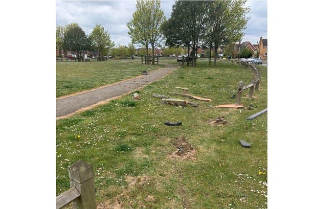 The fence damaged in the crash along Hargate Way on Monday.