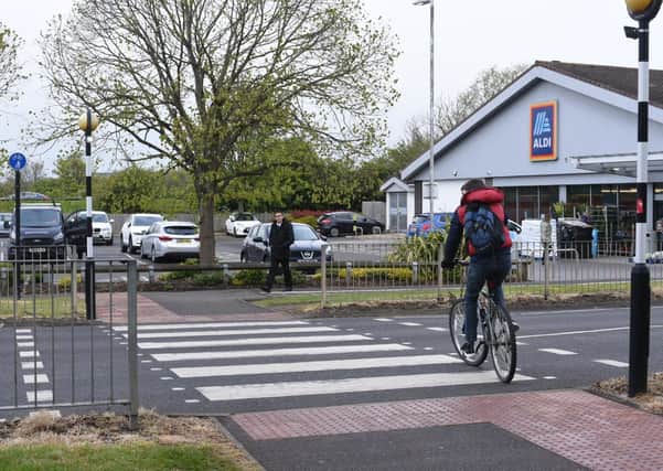 The crossing outside Aldi along the A605.
