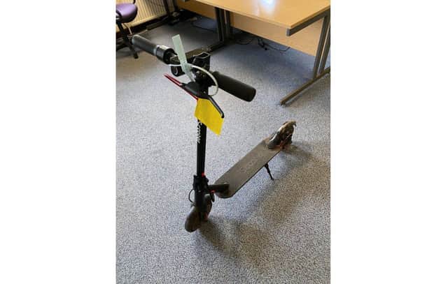 The electric scooter seized from the 16-year-old boy.