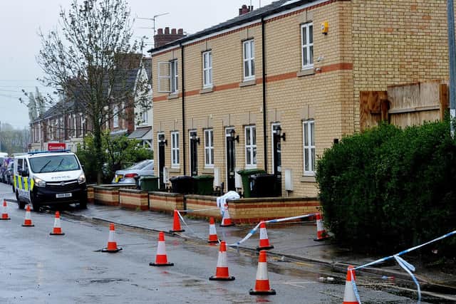 Police at the scene in Crown Street, Peterborough.