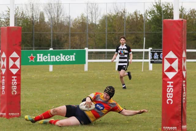 George Neale scores a try for Borough Under 16s at Rushden & Higham.