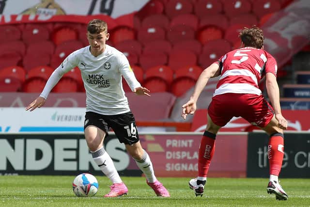 Harrison Burrows in action for Posh at Doncaster on the final day of the League One season. Photo: Joe Dent/theposh.com.