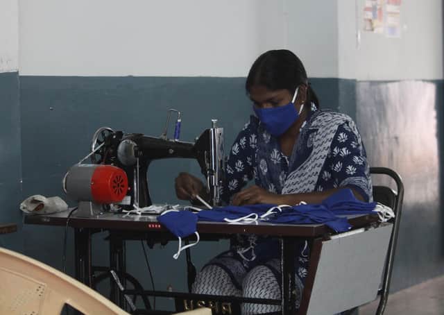 Each sewing machine costs around £200 - much needed for Smile International to ramp up supply of masks. EMN-210513-121445001