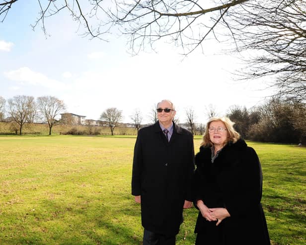 John Holdich and cabinet member Lynne Ayres at the site of the new university