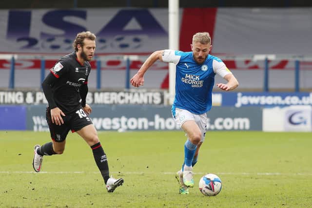 Dan Butler (right) in action for Posh. Photo: Joe Dent/theposh.com.