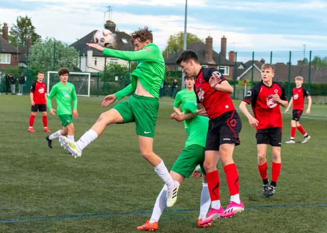 Play-off action from Netherton United Under 18s (red) v Dereham Town. Photo: Carl Rumble.