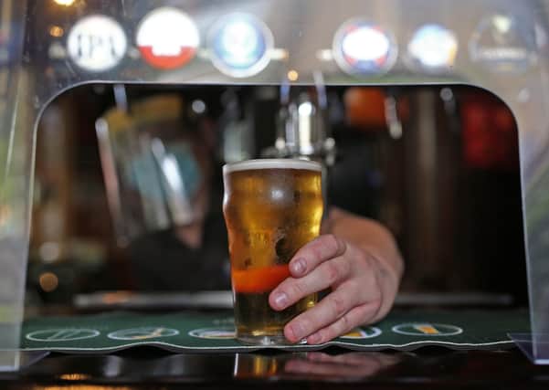 Peterborough pub-goers drink up to 146 pints per minute on Monday. Photo: PA EMN-210520-161453001