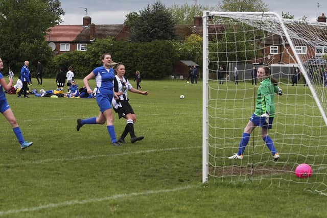 Codie Steward (stripes) scores for Peterborough Northern Star Under 16s against Saffron Walden. Photo: Tim Symonds.