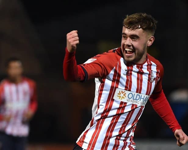 Alfie McCalmont after scoring for Oldham at Cambridge last season. Photo: Joe Giddins PA Wire