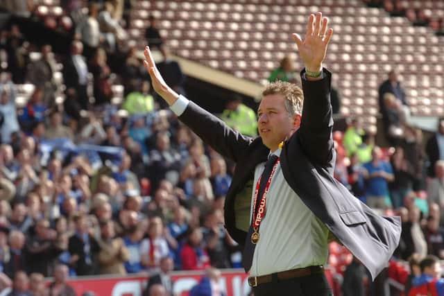 Posh manager Darren Ferguson celebrates the League One play-off final win at Old Trafford in 2011.